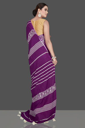 Buy gorgeous purple and red striped modal silk saree online in USA. Be the highlight of the occasion in beautiful pure silk saree, designer saris, handloom sarees, embroidered sarees, Kanchipuram sarees, Banarasi saris from Pure Elegance Indian saree store in USA.-back