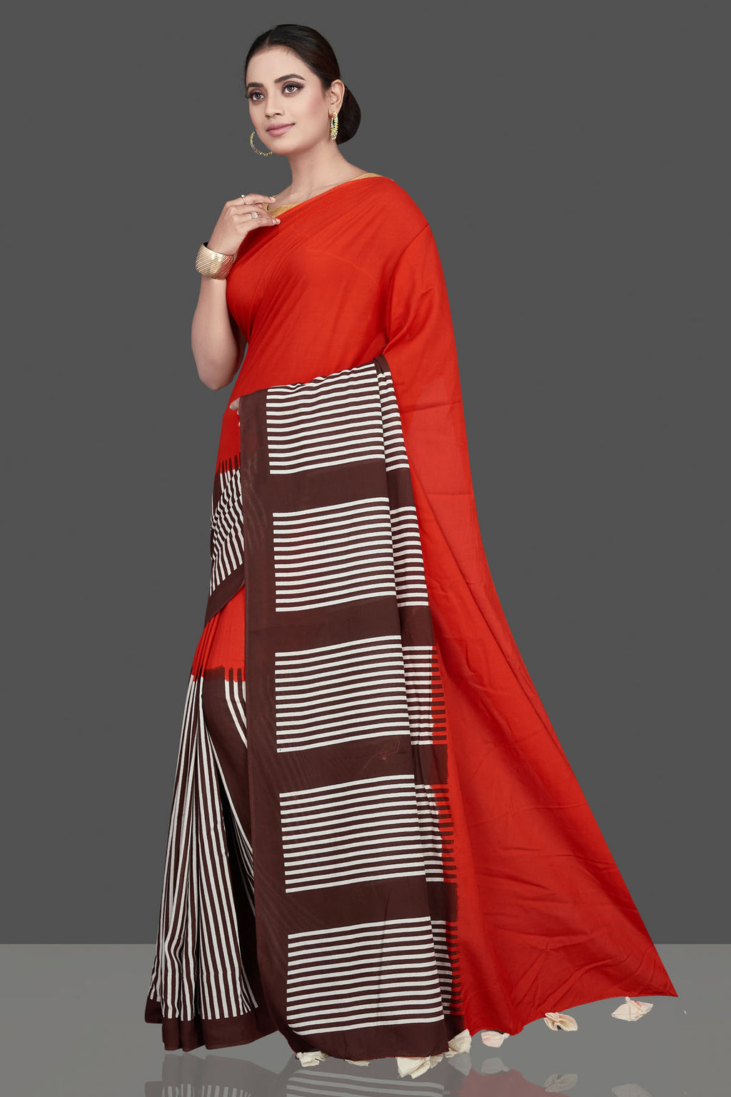 Shop stunning red and brown striped modal silk sari online in USA. Be the highlight of the occasion in beautiful pure silk saree, designer saris, handloom sarees, embroidered sarees, Kanchipuram sarees, Banarasi saris from Pure Elegance Indian saree store in USA.-full view