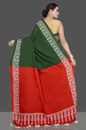Shop gorgeous green and red modal silk saree online in USA with printed white border. Be the highlight of the occasion in beautiful pure silk saree, designer saris, handloom sarees, embroidered sarees, Kanchipuram sarees, Banarasi saris from Pure Elegance Indian saree store in USA.-back
