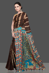 Buy stunning brown tussar silk saree online in USA with pen Kalamkari pallu. Flaunt ethnic fashion on special occasions in stunning georgette sarees, designer saris, embroidered sarees, pure silk sarees, Kanchipuram sarees from Pure Elegance Indian fashion store in USA.-full view