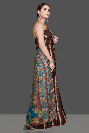 Buy stunning brown tussar silk saree online in USA with pen Kalamkari pallu. Flaunt ethnic fashion on special occasions in stunning georgette sarees, designer saris, embroidered sarees, pure silk sarees, Kanchipuram sarees from Pure Elegance Indian fashion store in USA.-side