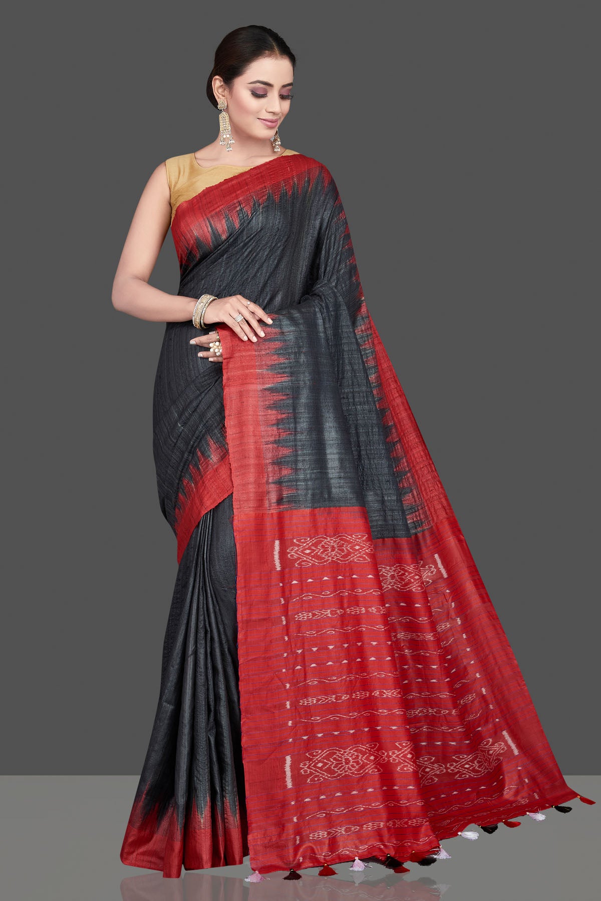 Shop beautiful black Gopalpur tussar silk saree online in USA with red temple border. Flaunt ethnic fashion on special occasions in stunning georgette sarees, designer saris, embroidered sarees, pure silk sarees, Kanchipuram saris from Pure Elegance Indian fashion store in USA.-front