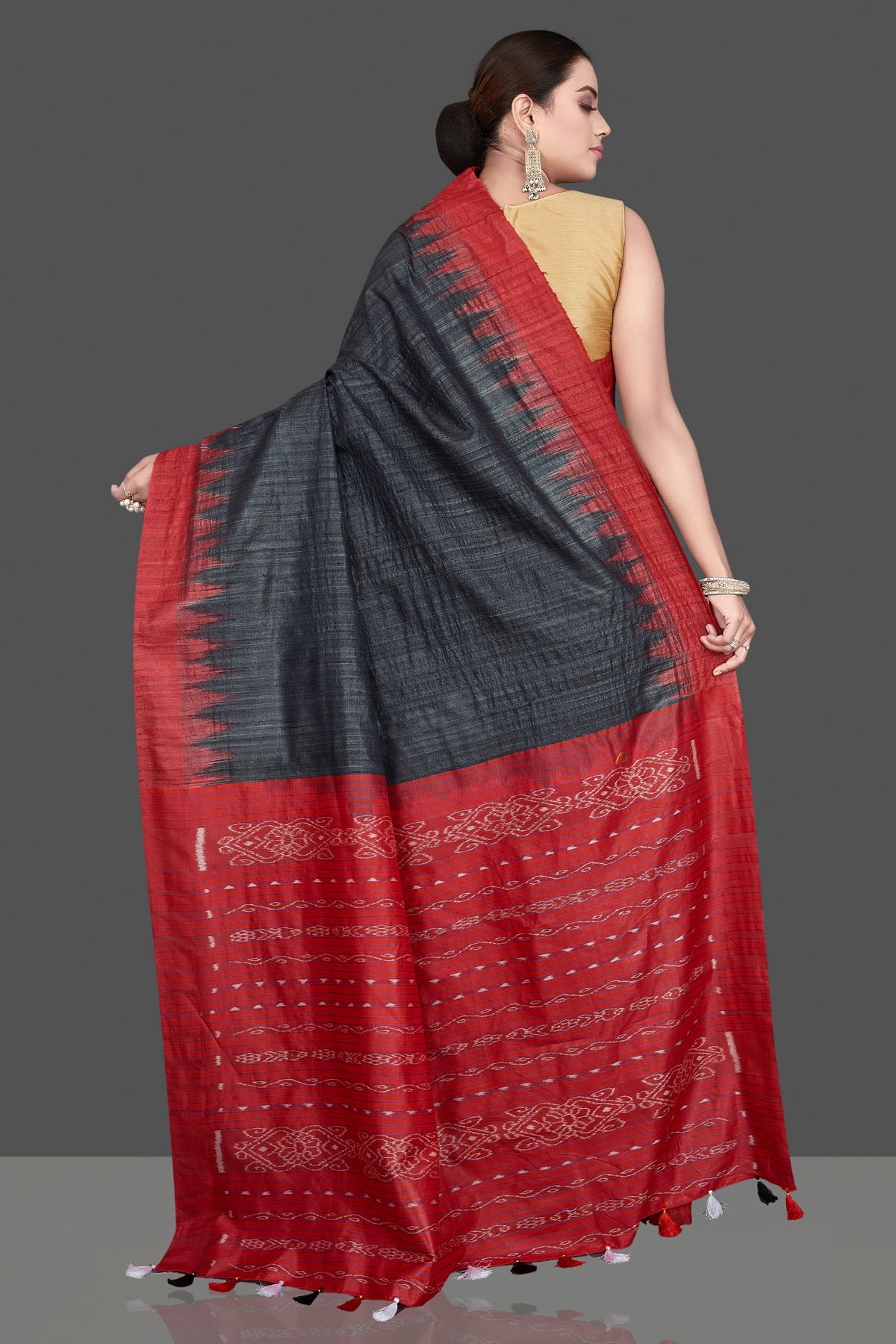 Shop beautiful black Gopalpur tussar silk saree online in USA with red temple border. Flaunt ethnic fashion on special occasions in stunning georgette sarees, designer saris, embroidered sarees, pure silk sarees, Kanchipuram saris from Pure Elegance Indian fashion store in USA.-back