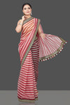 Buy beautiful red and cream striped organza saree online in USA with embroidered border. Turn heads on special occasion in stunning handwoven sarees, organza saris, pure silk sarees, Banarasi sarees, embroidered sarees from Pure Elegance Indian saree store in USA.-full view