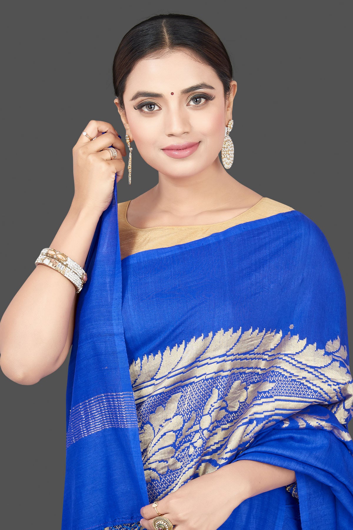 Shop beautiful Indigo blue Muga Banarasi saree online in USA with zari work. Get your hands on beautiful Indian handloom sarees, pure silk saris, designer sarees, embroidered sarees, Banarasi sarees from Pure Elegance Indian fashion store in USA.-closeup