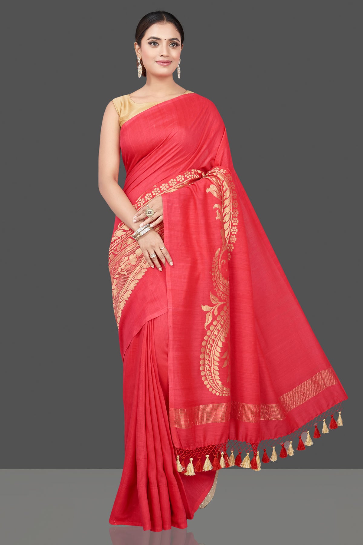 Buy beautiful tomato red Muga Banarasi saree online in USA with zari work. Get your hands on beautiful Indian handloom sarees, pure silk saris, designer sarees, embroidered sarees, Banarasi sarees from Pure Elegance Indian fashion store in USA.-front