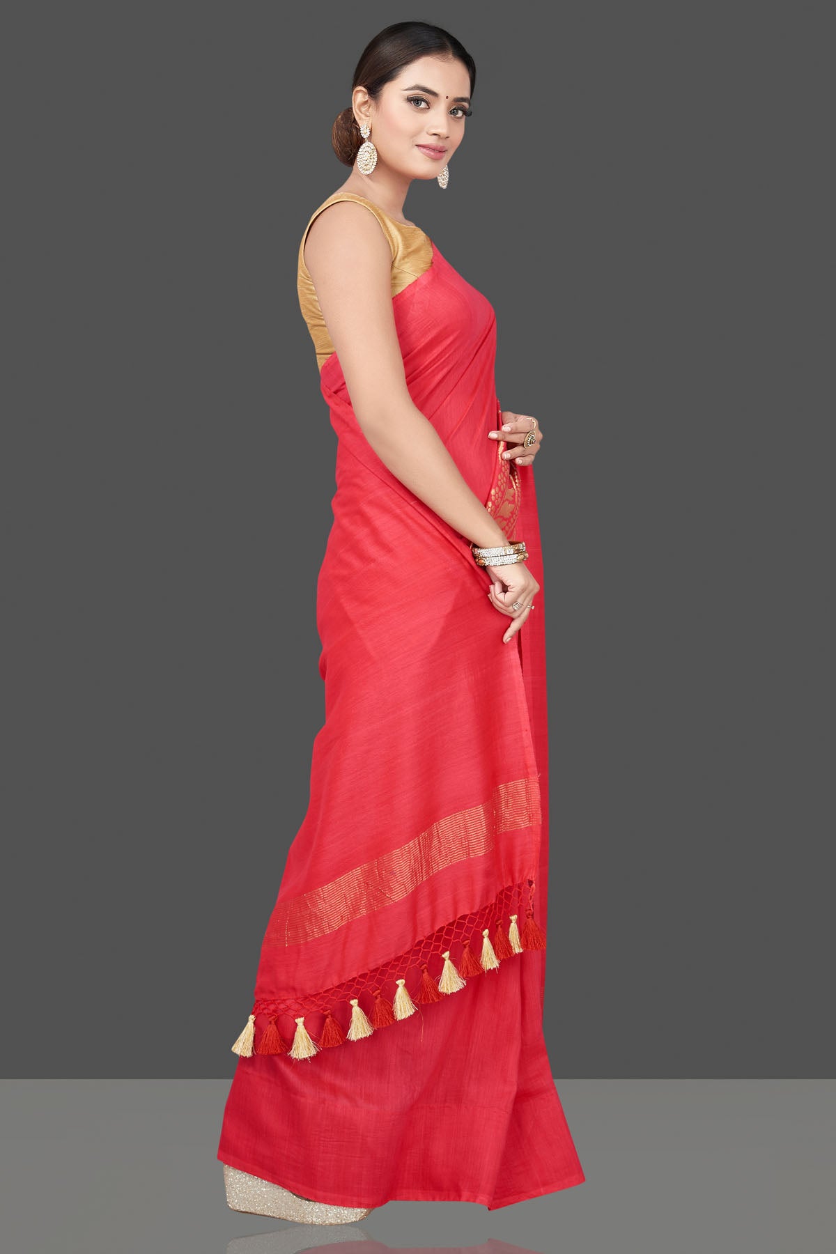 Buy beautiful tomato red Muga Banarasi saree online in USA with zari work. Get your hands on beautiful Indian handloom sarees, pure silk saris, designer sarees, embroidered sarees, Banarasi sarees from Pure Elegance Indian fashion store in USA.-side