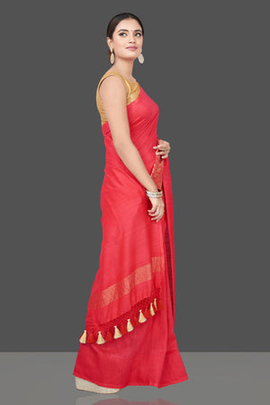 Buy beautiful tomato red Muga Banarasi saree online in USA with zari work. Get your hands on beautiful Indian handloom sarees, pure silk saris, designer sarees, embroidered sarees, Banarasi sarees from Pure Elegance Indian fashion store in USA.-right