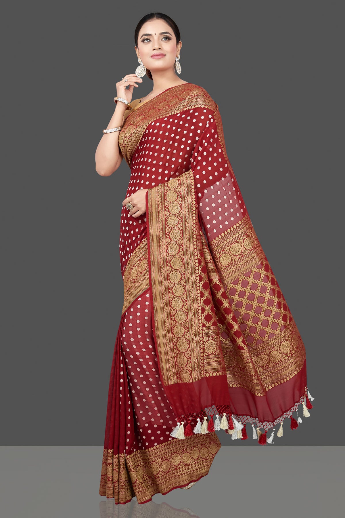 Buy beautiful maroon georgette sari online in USA with zari buta and border. Get your hands on beautiful Indian handloom sarees, pure silk saris, designer sarees, embroidered sarees, Banarasi sarees from Pure Elegance Indian fashion store in USA.-pallu
