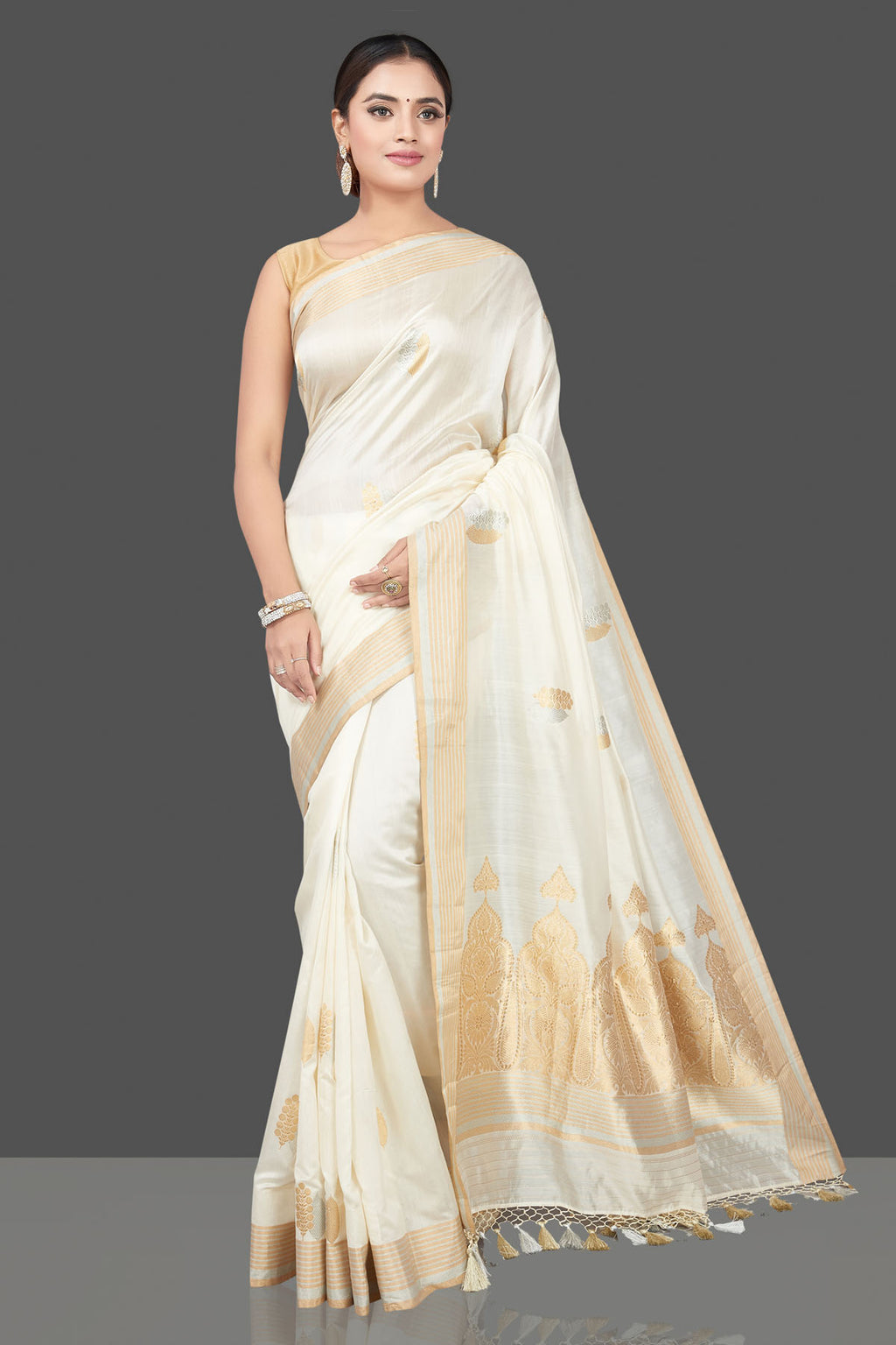 Buy beautiful cream chenya silk sari online in USA with zari border. Get your hands on beautiful Indian handloom sarees, pure silk saris, designer sarees, embroidered sarees, Banarasi sarees from Pure Elegance Indian fashion store in USA.-full view