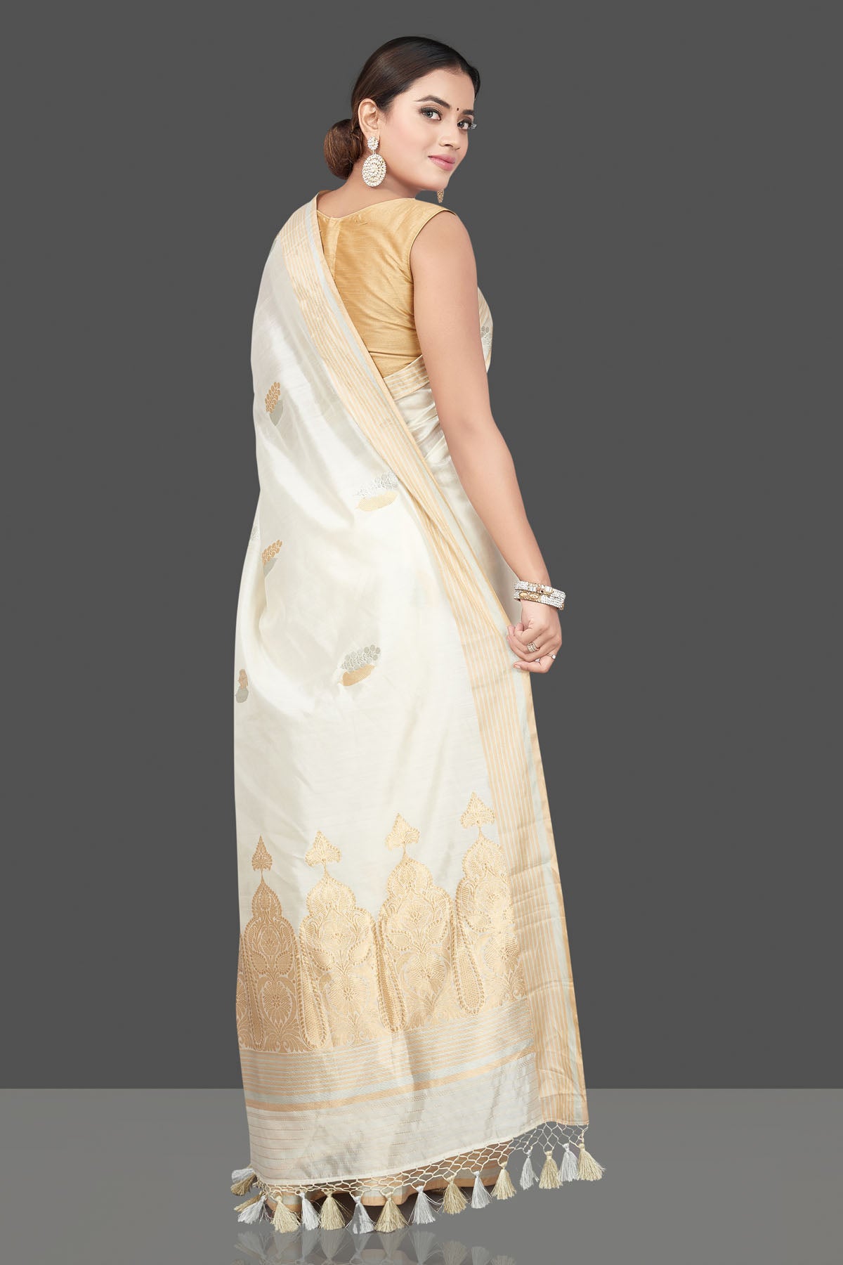 Buy beautiful cream chenya silk sari online in USA with zari border. Get your hands on beautiful Indian handloom sarees, pure silk saris, designer sarees, embroidered sarees, Banarasi sarees from Pure Elegance Indian fashion store in USA.-back