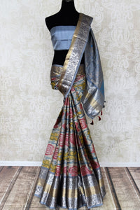 Shop stunning blue Kanji ikkat saree online in USA with zari work. Look attractive on special occasions in the beautiful silk sarees, designer saris, embroidered saris, handwoven saris from Pure Elegance Indian fashion store in USA.-full view
