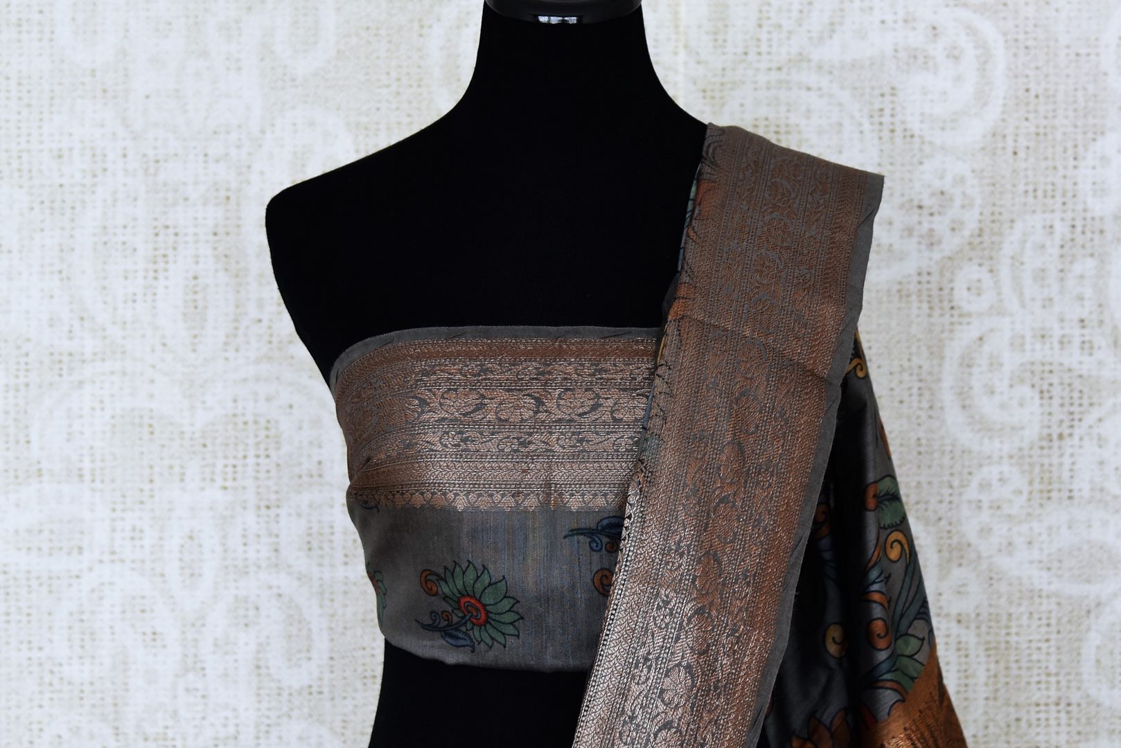 Shop gorgeous dark grey Kalamkari print tussar silk sari online in USA with zari border. Look attractive on special occasions in the beautiful silk sarees, designer saris, embroidered sarees, handwoven saris from Pure Elegance Indian fashion store in USA.-blouse pallu