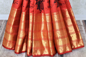 Buy beautiful red Gadhwal silk printed saree online in USA with golden zari border. Look attractive on special occasions in the beautiful silk sarees, designer saris, embroidered sarees, handwoven saris from Pure Elegance Indian fashion store in USA.-pleats