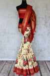 Shop stunning cream floral print Gadhwal silk sari online in USA with red zari border. Be the center of attraction at weddings and special occasions in exquisite designer sarees, handwoven silk saris, organza sarees, pure silk saris from Pure Elegance Indian fashion store in USA.-full view