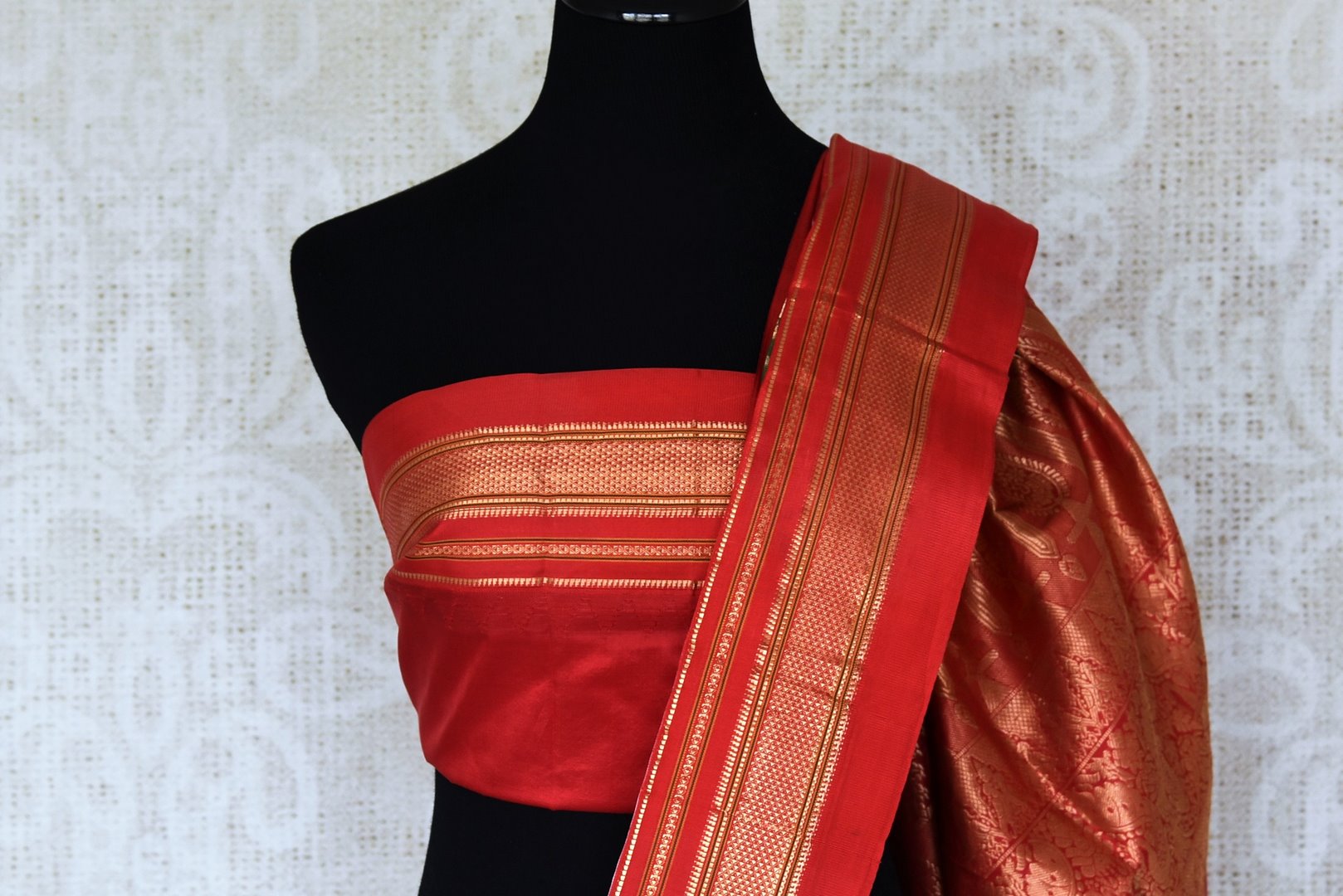 Shop stunning cream floral print Gadhwal silk sari online in USA with red zari border. Be the center of attraction at weddings and special occasions in exquisite designer sarees, handwoven silk saris, organza sarees, pure silk saris from Pure Elegance Indian fashion store in USA.-blouse pallu
