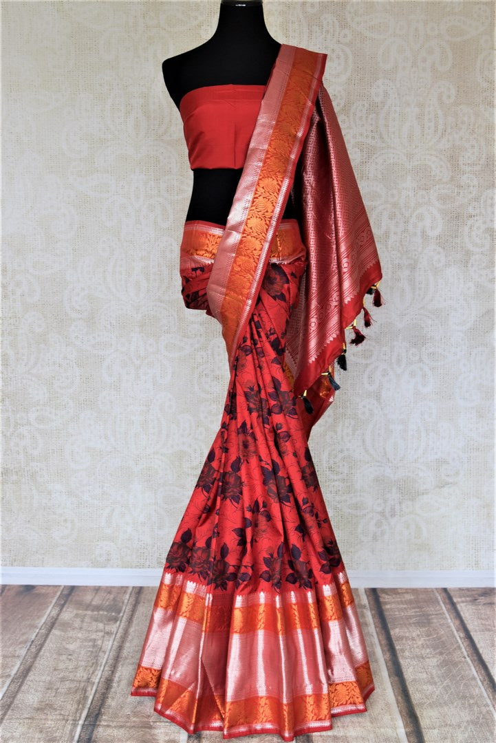 Buy gorgeous red floral print Gadhwal silk saree online in USA with golden zari border and zari pallu. Look attractive on special occasions in the beautiful silk sarees, designer saris, embroidered sarees, handwoven saris from Pure Elegance Indian fashion store in USA.-full view