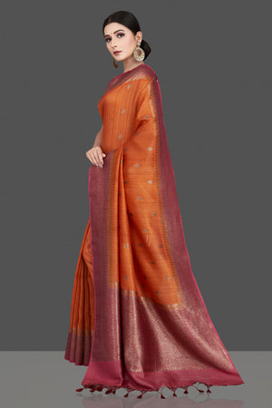 Shop gorgeous rust orange tussar silk saree online in USA with pink antique golden zari border. Be the center of attraction at weddings and special occasions in exquisite designer sarees, handwoven silk saris, embroidered sarees, pure silk sarees from Pure Elegance Indian fashion store in USA.-pallu
