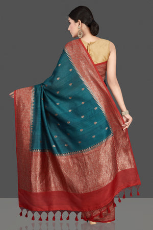 Shop stunning teal green tussar silk saree online in USA with red antique golden zari border. Be the center of attraction at weddings and special occasions in exquisite designer sarees, handwoven silk saris, embroidered sarees, pure silk sarees from Pure Elegance Indian fashion store in USA.-back