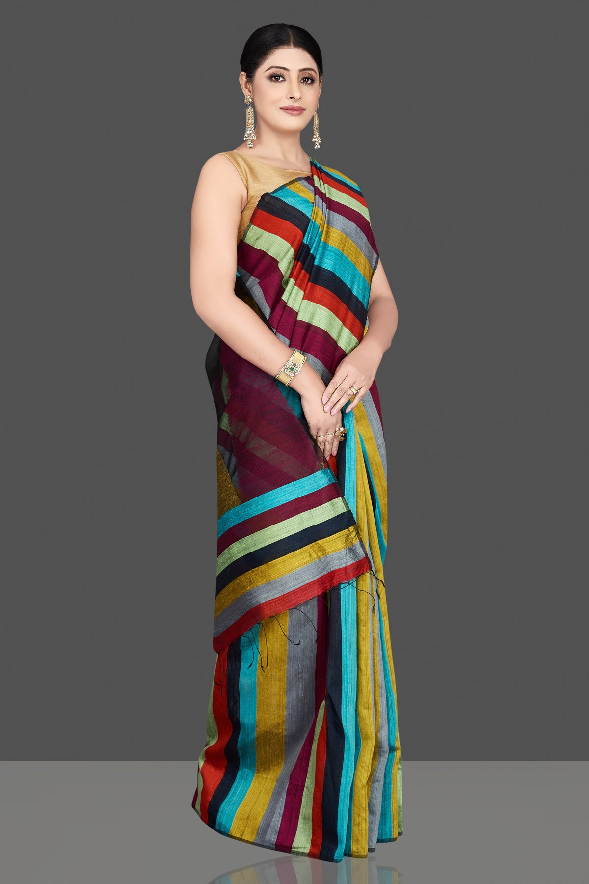 Buy stunning multicolor stripes matka silk saree online in USA. Be the center of attraction at weddings and special occasions in gorgeous designer sarees, handwoven silk sarees, embroidered sarees, pure silk sarees from Pure Elegance Indian fashion store in USA.-right