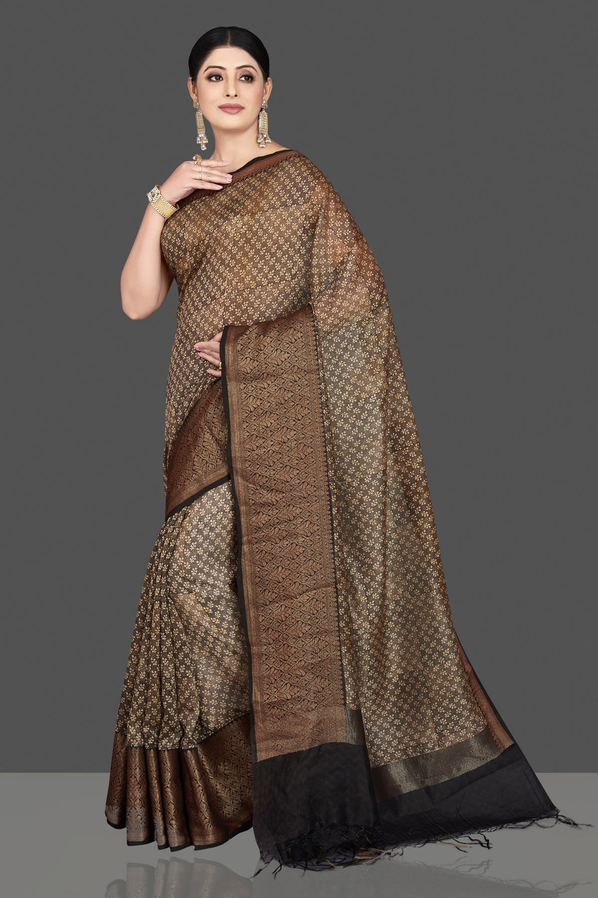 Shop gorgeous brown chanderi cotton silk sari online in USA with antique zari border. Be the center of attraction at weddings and special occasions in exquisite designer sarees, handwoven silk sarees, embroidered saris, pure silk sarees from Pure Elegance Indian fashion store in USA.-pallu