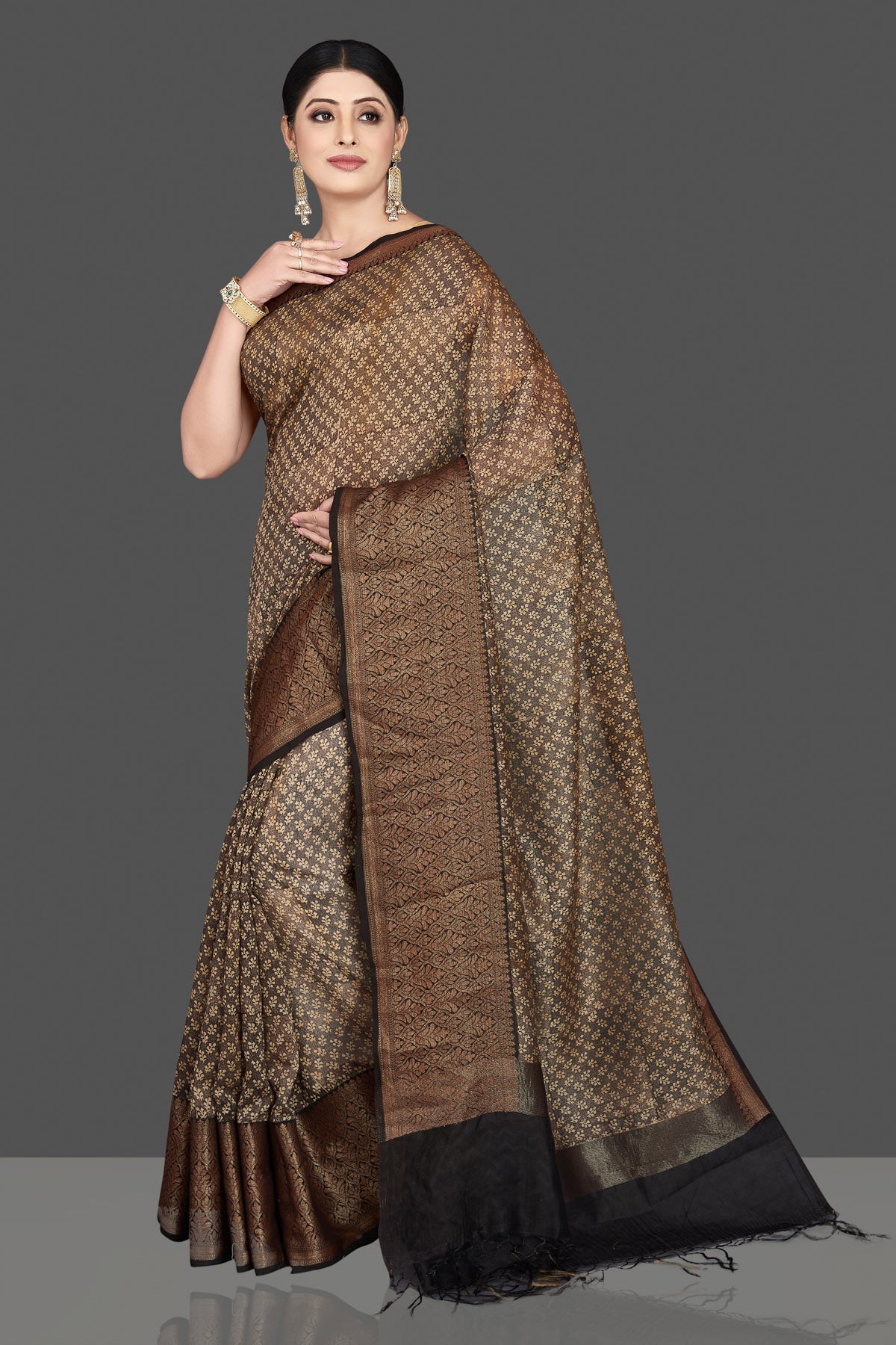 Shop gorgeous brown chanderi cotton silk sari online in USA with antique zari border. Be the center of attraction at weddings and special occasions in exquisite designer sarees, handwoven silk sarees, embroidered saris, pure silk sarees from Pure Elegance Indian fashion store in USA.-pallu