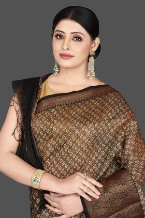 Shop gorgeous brown chanderi cotton silk sari online in USA with antique zari border. Be the center of attraction at weddings and special occasions in exquisite designer sarees, handwoven silk sarees, embroidered saris, pure silk sarees from Pure Elegance Indian fashion store in USA.-closeup