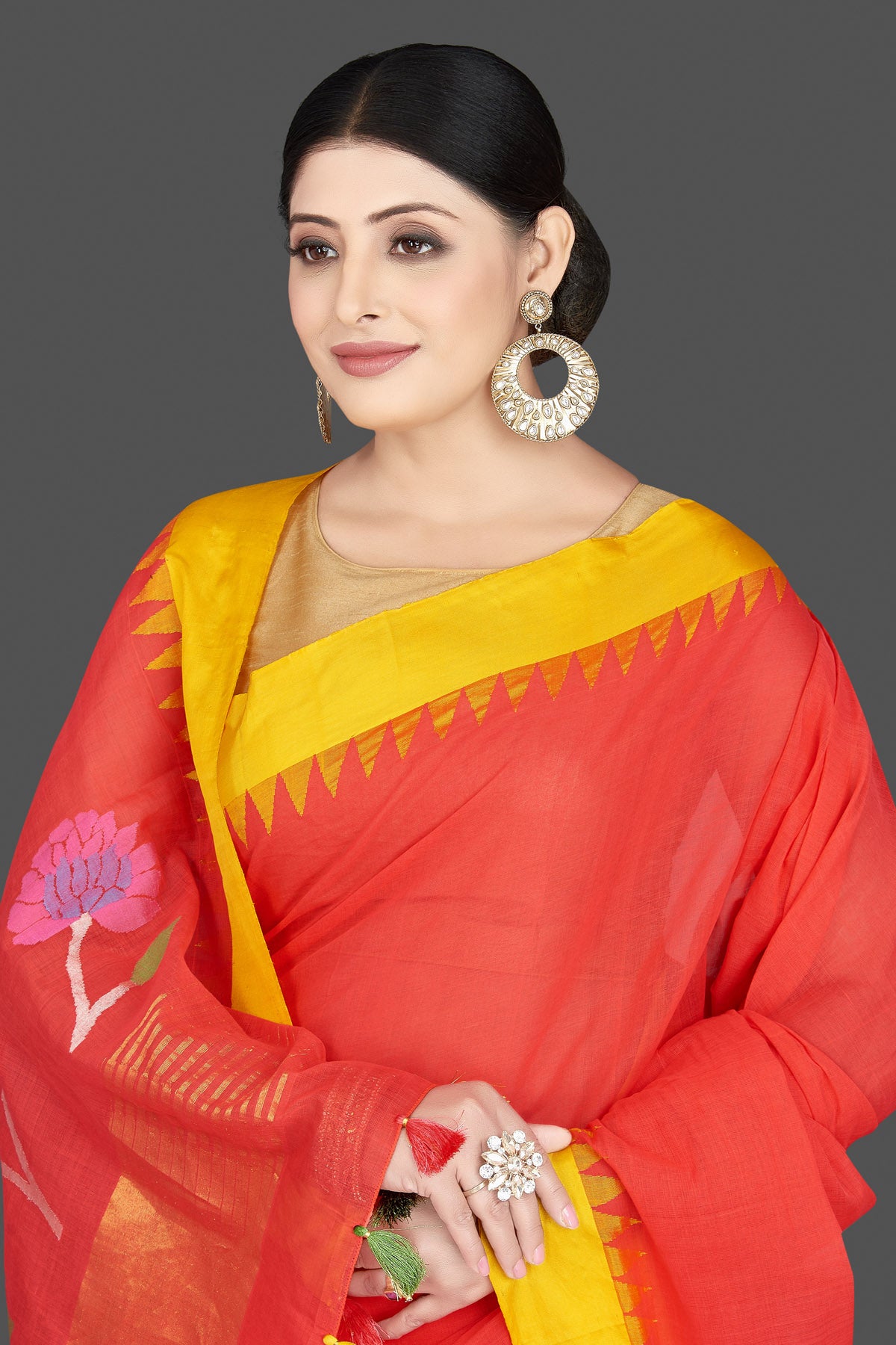 Shop gorgeous red khaddi saree online in USA with bird and floral design pallu. Be the center of attraction at weddings and special occasions in exquisite designer sarees, handwoven silk sarees, embroidered saris, pure silk sarees from Pure Elegance Indian fashion store in USA.-closeup