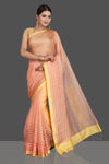Shop gorgeous peach matka silk saree online in USA with golden border. Be the center of attraction at weddings and special occasions in exquisite designer sarees, handwoven silk saris, embroidered sarees, pure silk sarees from Pure Elegance Indian fashion store in USA.-full view