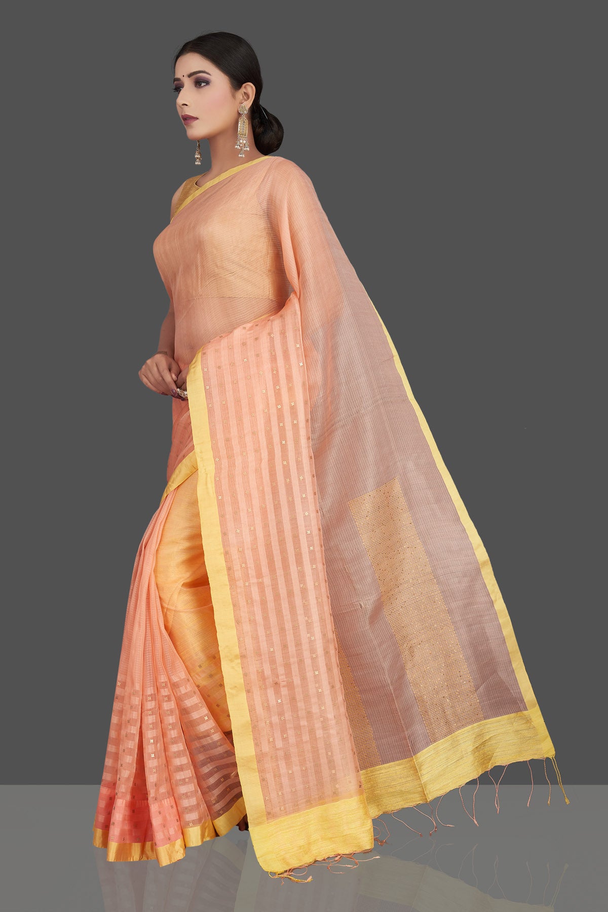 Shop gorgeous peach matka silk saree online in USA with golden border. Be the center of attraction at weddings and special occasions in exquisite designer sarees, handwoven silk saris, embroidered sarees, pure silk sarees from Pure Elegance Indian fashion store in USA.-pallu