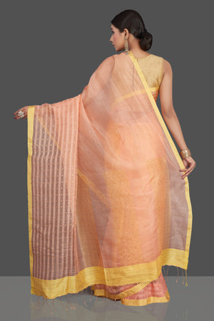 Shop gorgeous peach matka silk saree online in USA with golden border. Be the center of attraction at weddings and special occasions in exquisite designer sarees, handwoven silk saris, embroidered sarees, pure silk sarees from Pure Elegance Indian fashion store in USA.-back