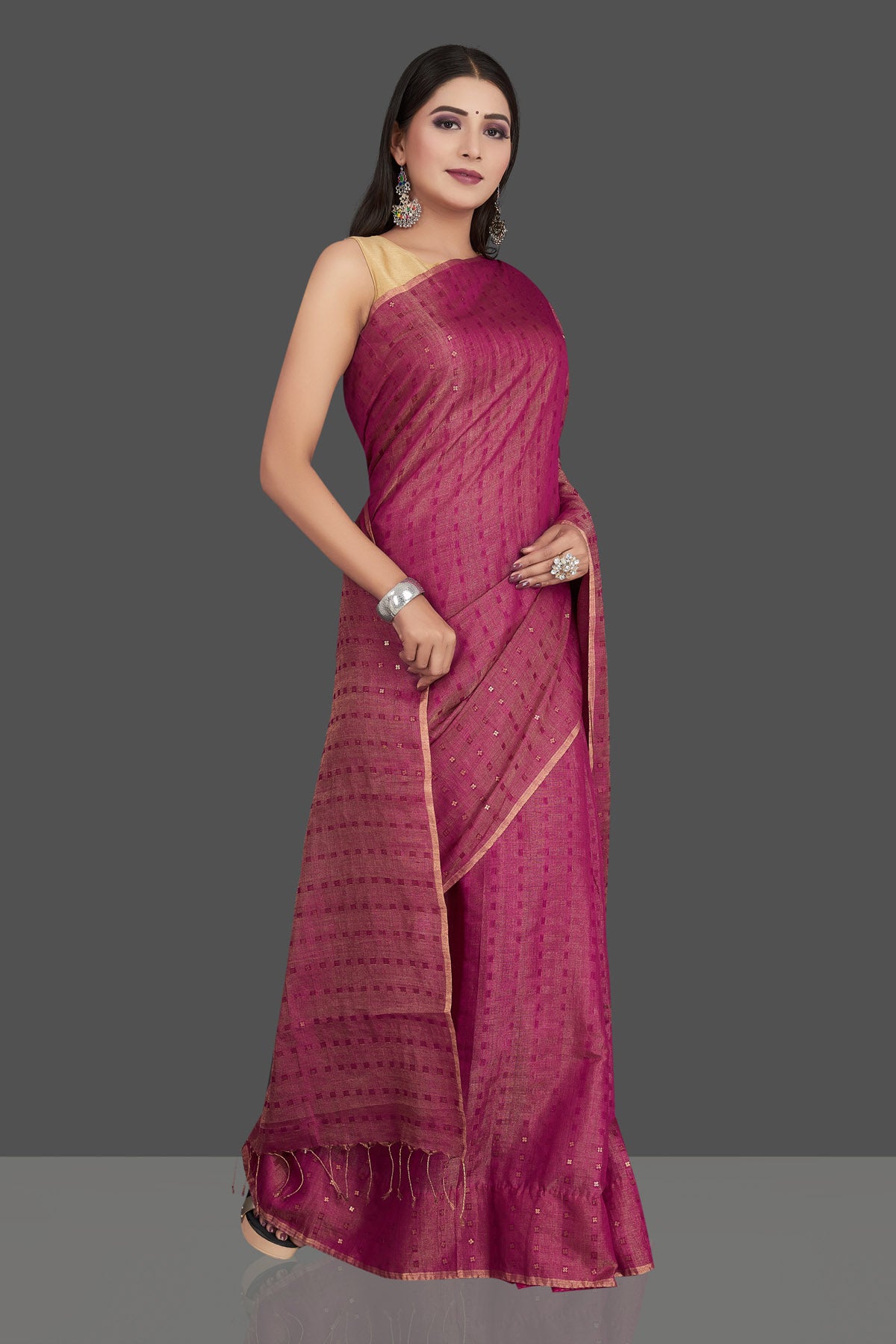 Shop stunning magenta matka silk saree online in USA with golden border. Be the center of attraction at weddings and special occasions in exquisite designer sarees, handwoven silk saris, embroidered sarees, pure silk sarees from Pure Elegance Indian fashion store in USA.-right