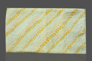 Shop stunning light yellow bandhani print chiffon sari online in USA. Be the center of attraction at weddings and special occasions in exquisite designer sarees, handwoven silk saris, embroidered sarees, pure silk sarees from Pure Elegance Indian fashion store in USA.-blouse