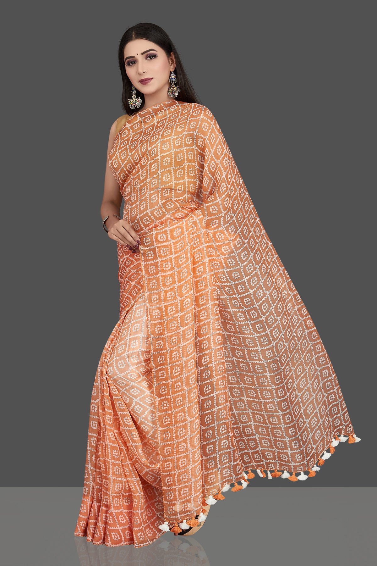 Shop stunning peach printed organza silk saree online in USA. Be the center of attraction at weddings and special occasions in exquisite designer sarees, handwoven silk sarees, embroidered saris, pure silk saris from Pure Elegance Indian fashion store in USA.-full view