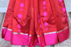 Shop beautiful red chanderi silk saree online in USA with pink border and flower buta. Be the center of attraction at parties and weddings in exclusive Kanchipuram silk sarees, pure silk sarees, handloom silk sarees, Banarasi silk sarees from Pure Elegance Indian fashion store in USA.-pleats