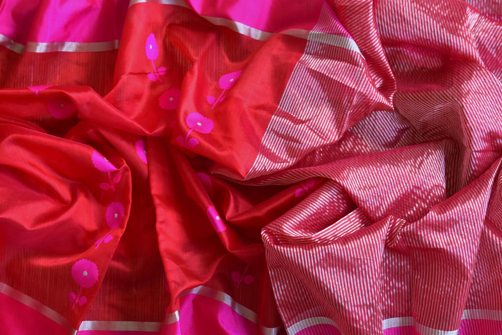 Shop beautiful red chanderi silk saree online in USA with pink border and flower buta. Be the center of attraction at parties and weddings in exclusive Kanchipuram silk sarees, pure silk sarees, handloom silk sarees, Banarasi silk sarees from Pure Elegance Indian fashion store in USA.-details