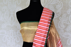 Shop stunning pink chanderi silk saree online in USA with golden and white stripes. Be the center of attraction at parties and weddings in exclusive Kanchipuram silk sarees, pure silk sarees, handloom silk sarees, Banarasi silk sarees from Pure Elegance Indian fashion store in USA.-blouse pallu