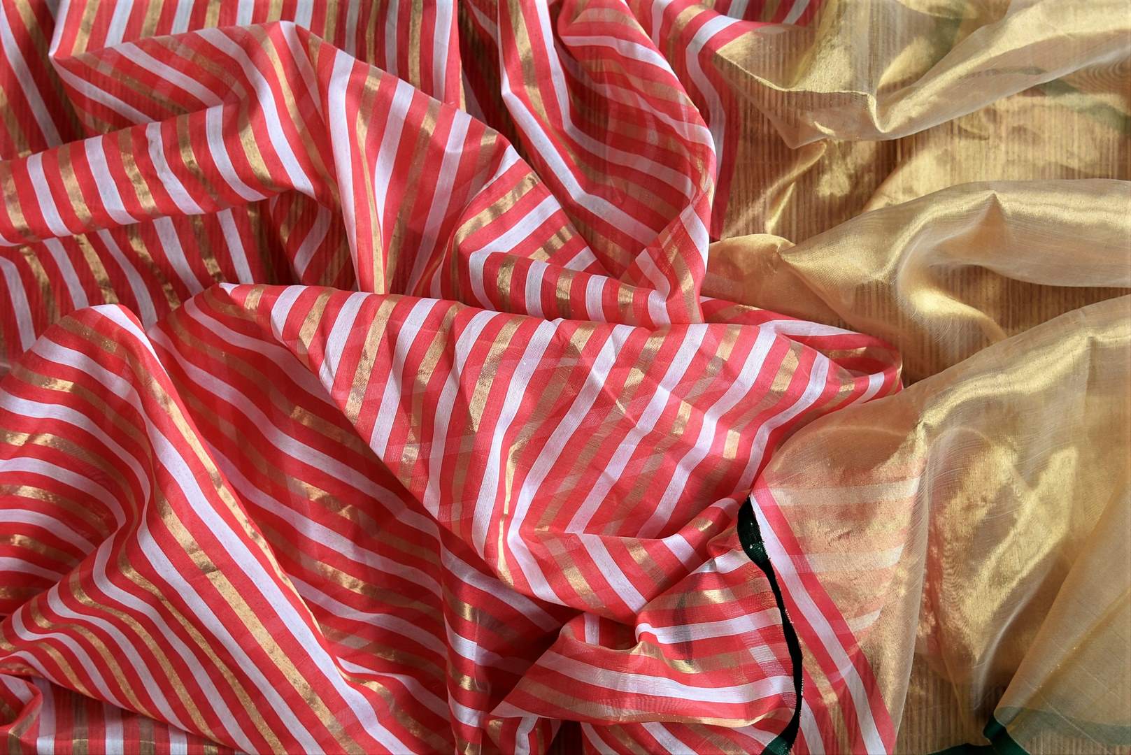 Shop stunning pink chanderi silk saree online in USA with golden and white stripes. Be the center of attraction at parties and weddings in exclusive Kanchipuram silk sarees, pure silk sarees, handloom silk sarees, Banarasi silk sarees from Pure Elegance Indian fashion store in USA.-details