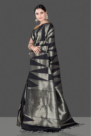 Shop stunning black and silver Kanchipuram saree online in USA. Go for a rich traditional look at weddings and festive occasions in exclusive Kanchipuram silk sarees. south silk sarees, handloom silk sarees, Banarasi saris from Pure Elegance Indian fashion store in USA.-left