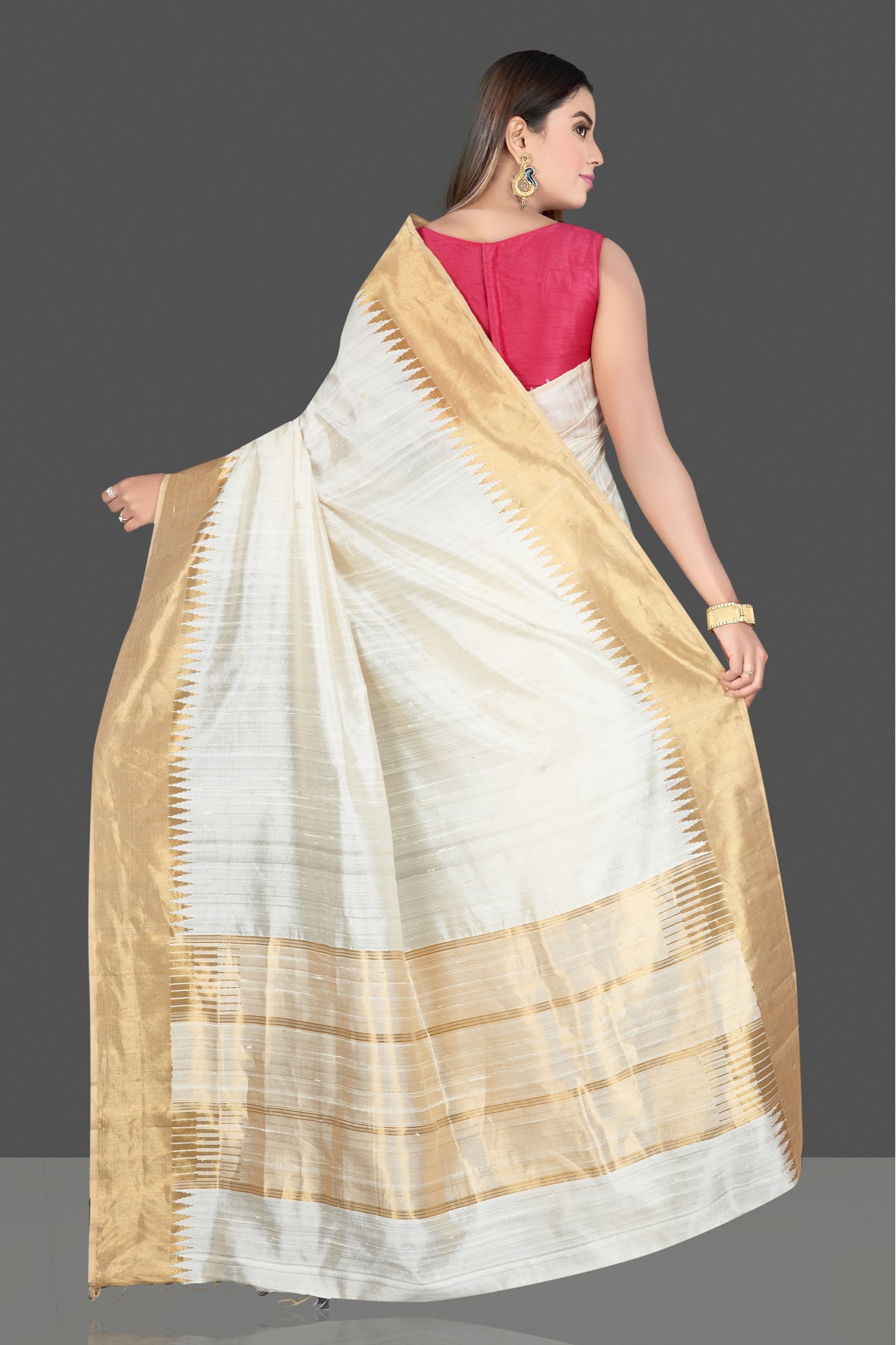 Buy beautiful cream silk saree online in USA with golden temple zari border. Look traditional on special occasions and weddings in gorgeous silk sarees, Kanjivaram sarees, south silk sarees, handloom silk sarees from Pure Elegance Indian saree store in USA.-back