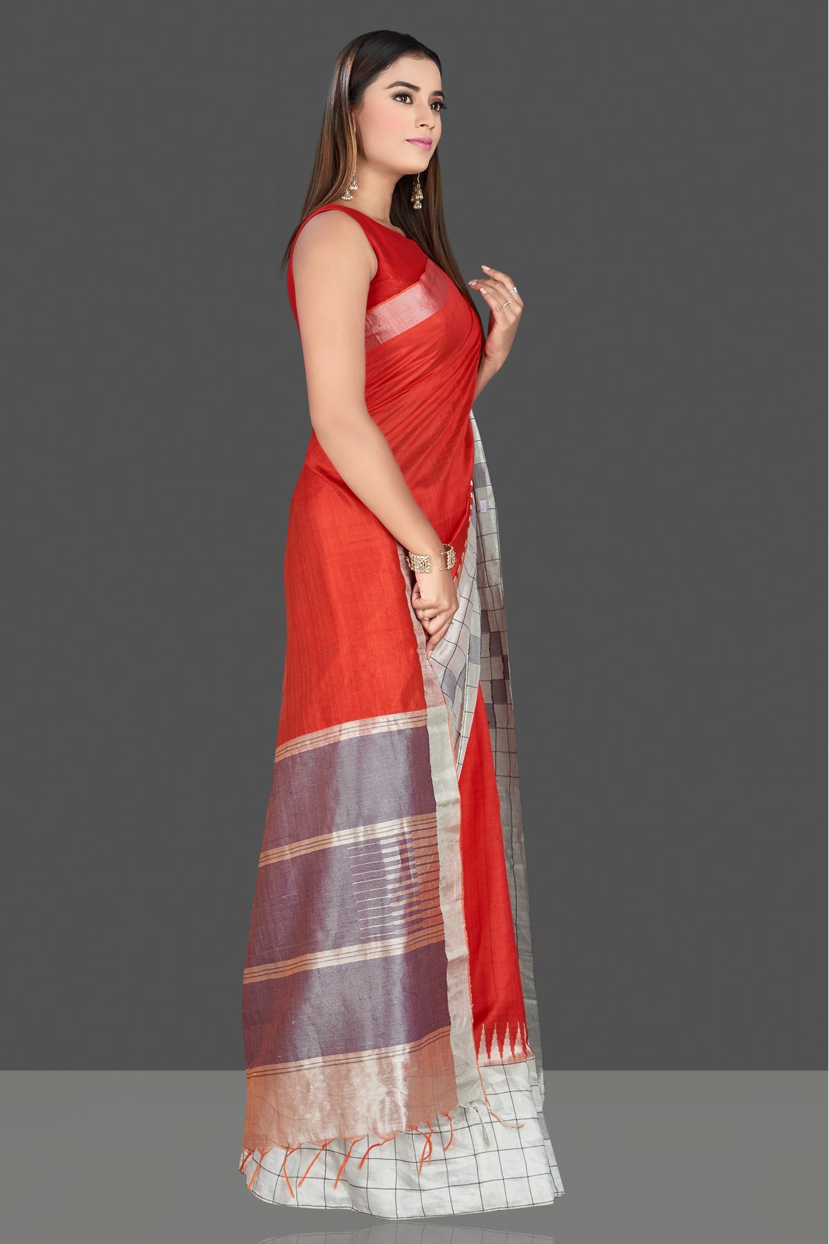 Shop stunning red silk sari online in USA with tissue border. Look traditional on special occasions and weddings in gorgeous silk sarees, Kanjivaram sarees, south silk sarees, handloom silk sarees from Pure Elegance Indian saree store in USA.-right