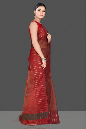 Shop stunning maroon muslin Jamdani saree online in USA with sequin border. Radiate traditional elegance on festive occasions in beautiful handloom silk sarees, paithani sarees, Lucknowi sarees, embroidered sarees from Pure Elegance Indian saree store in USA.-right