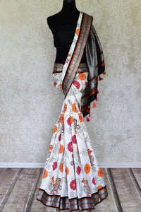 Shop stunning off-white floral print Gadhwal silk saree online in USA. Be the center of attraction at parties and weddings in exclusive Kanchipuram silk sarees, pure silk sarees, handloom silk sarees, Banarasi silk sarees from Pure Elegance Indian fashion store in USA.-full view