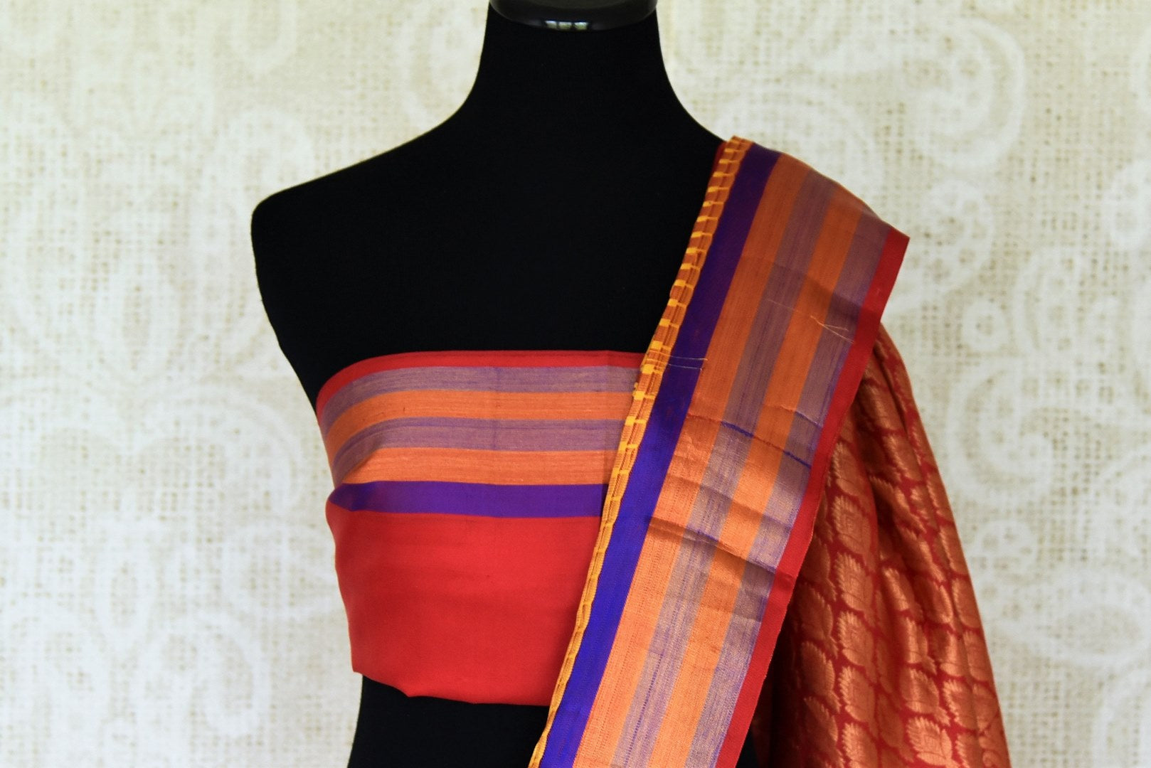 Buy beautiful mustard floral print Gadhwal silk saree online in USA with multicolor border. Be the center of attraction at parties and weddings in exclusive Kanchipuram silk sarees, pure silk sarees, handloom silk sarees, Banarasi silk sarees from Pure Elegance Indian fashion store in USA.-blouse pallu