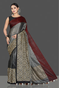 Buy beautiful grey tussar raw silk sari online in USA with black zari border. Keep your Indian wardrobe update with exclusive designer sarees, pure silk sarees, handloom silk sarees, Banarasi sarees from Pure Elegance Indian fashion store in USA.-full view