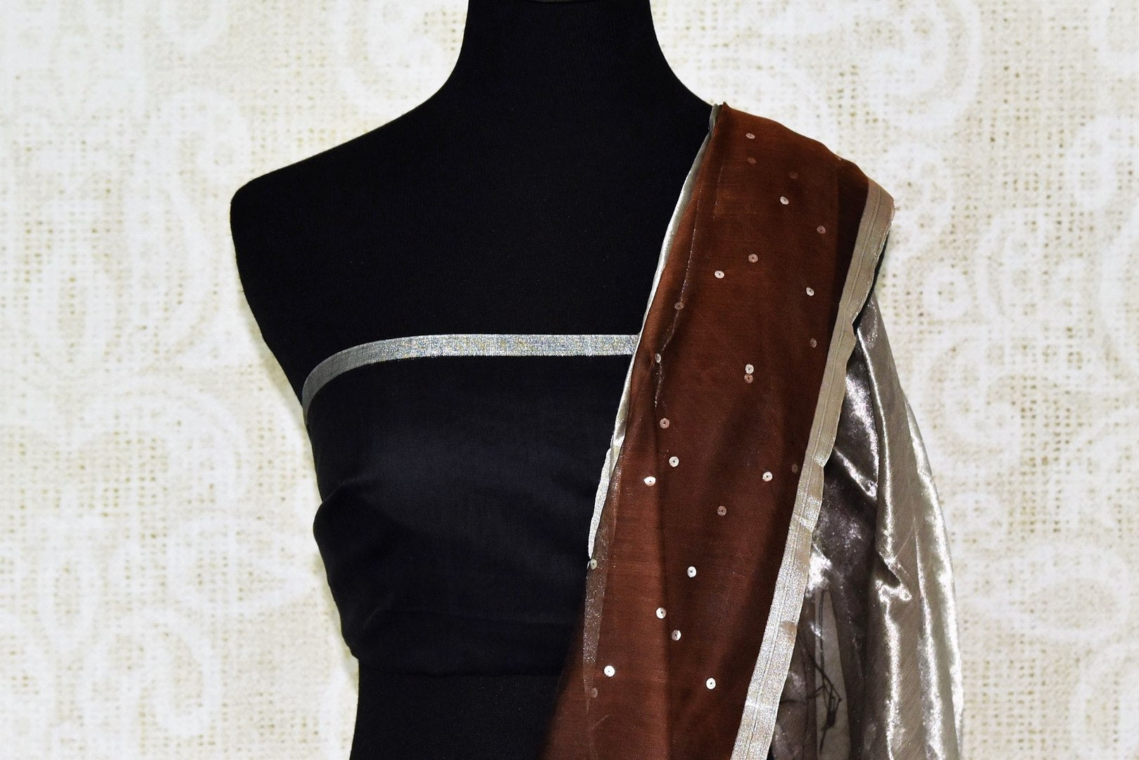 Shop gorgeous brown muslin matka silk sari online in USA with silver aanchal. Be the center of attraction on special occasions in beautiful handloom sarees, matka silk sarees, pure silk saris, Kanchipuram silk sarees, south silk sarees from Pure Elegance Indian saree store in USA.-blouse pallu