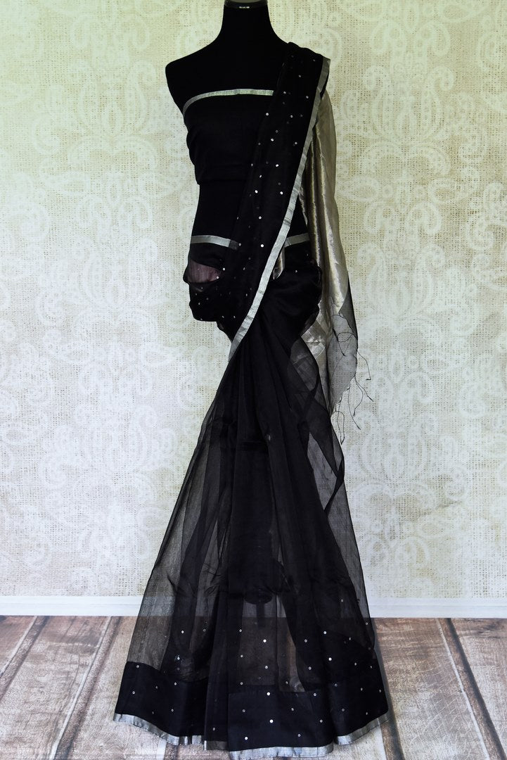 Shop beautiful black muslin matka silk saree online in USA with silver aanchal. Be the center of attraction on special occasions in beautiful handloom sarees, matka silk sarees, pure silk saris, Kanchipuram silk sarees, south silk sarees from Pure Elegance Indian saree store in USA.-full view