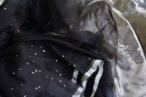 Shop beautiful black muslin matka silk saree online in USA with silver aanchal. Be the center of attraction on special occasions in beautiful handloom sarees, matka silk sarees, pure silk saris, Kanchipuram silk sarees, south silk sarees from Pure Elegance Indian saree store in USA.-details