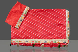 Shop gorgeous red Kota saree online in USA with lace border. Be the center of attraction on special occasion in beautiful designer sarees, handloom sarees, Kota silk sarees, Banarasi saris, Kanchipuram silk sarees from Pure Elegance Indian saree store in USA.-blouse