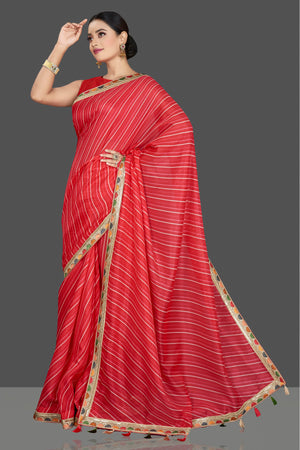 Shop gorgeous red Kota saree online in USA with lace border. Be the center of attraction on special occasion in beautiful designer sarees, handloom sarees, Kota silk sarees, Banarasi saris, Kanchipuram silk sarees from Pure Elegance Indian saree store in USA.-pallu